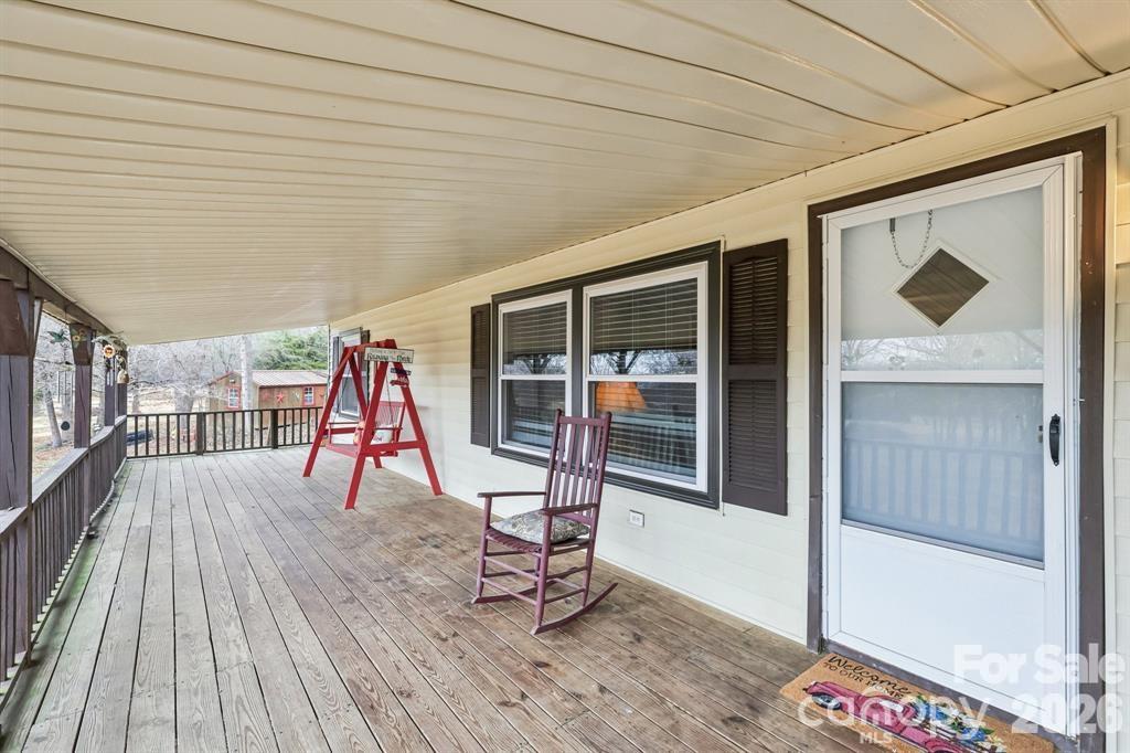 920 Dewitt Helms Road Monroe, NC 28112 - Photo 5 of 47 a view of livingroom with furniture and floor to ceiling window