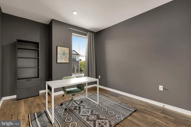 a workspace with wooden floor