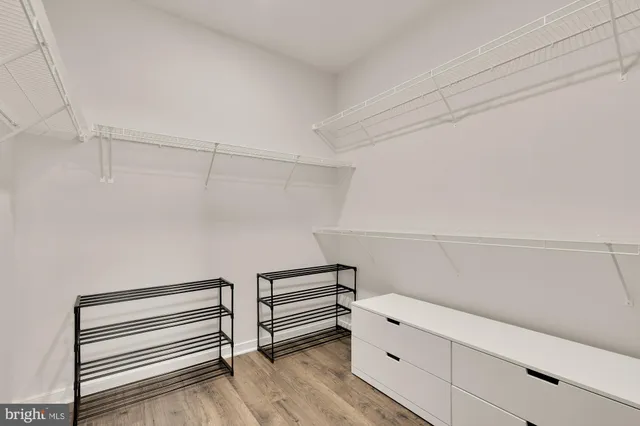 a bathroom with a double vanity sink and mirror