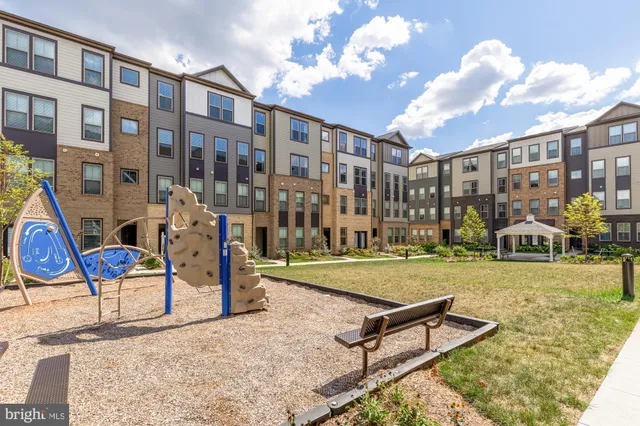 a view of a patio with swimming pool table and chairs