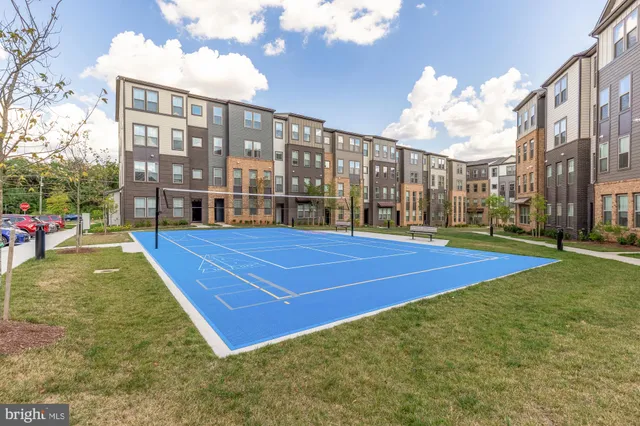 a view of a building with a swimming pool