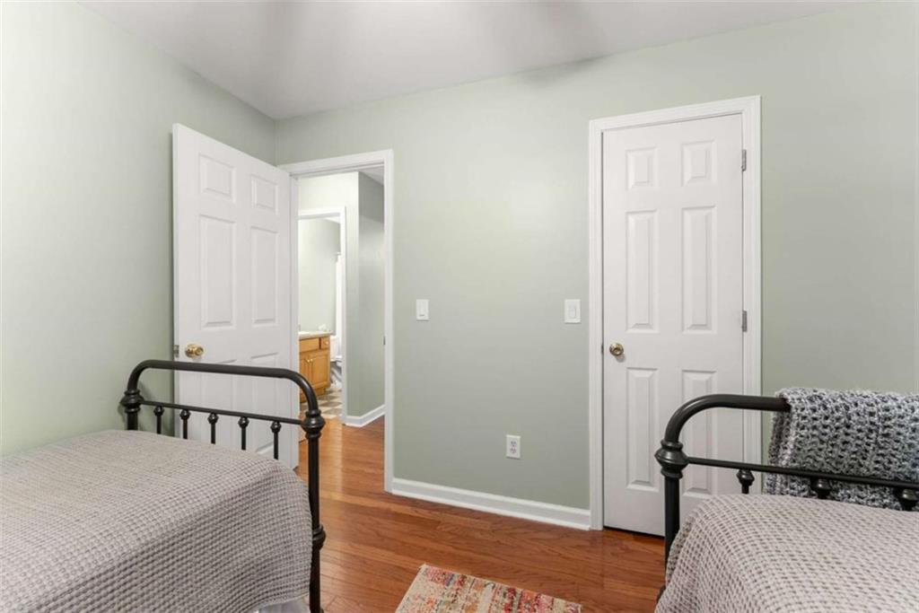 7210 Fields Drive Cumming, GA 30041 - Photo 28 of 58 a bedroom with a bed and a window