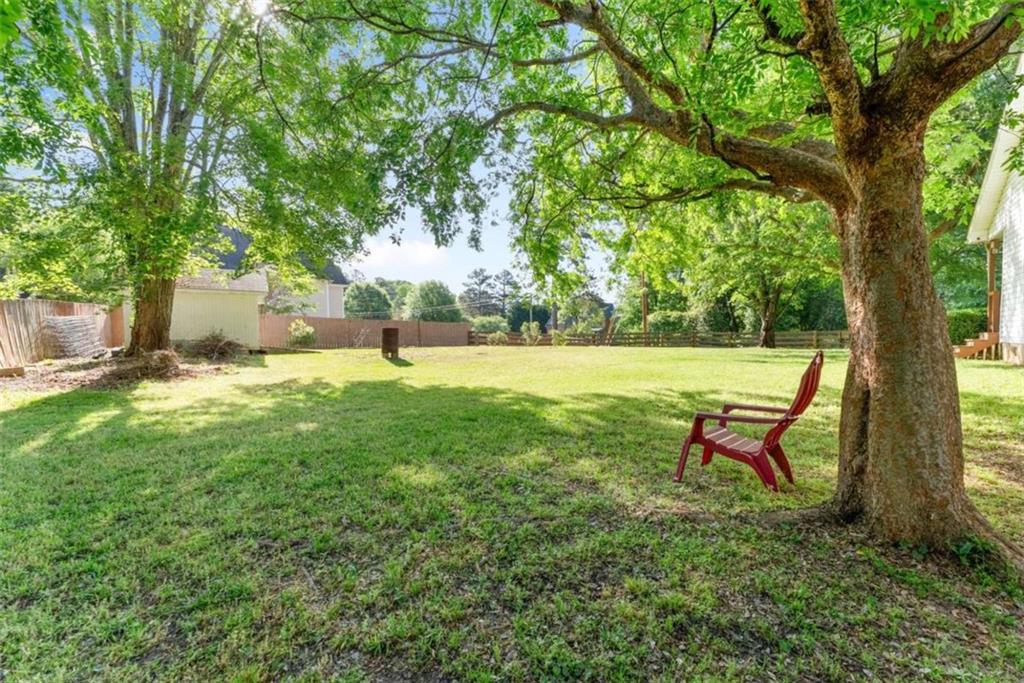 7210 Fields Drive Cumming, GA 30041 - Photo 39 of 58 a view of a park with large trees