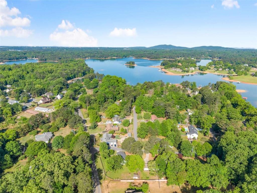 7210 Fields Drive Cumming, GA 30041 - Photo 47 of 58 a view of lake with mountain