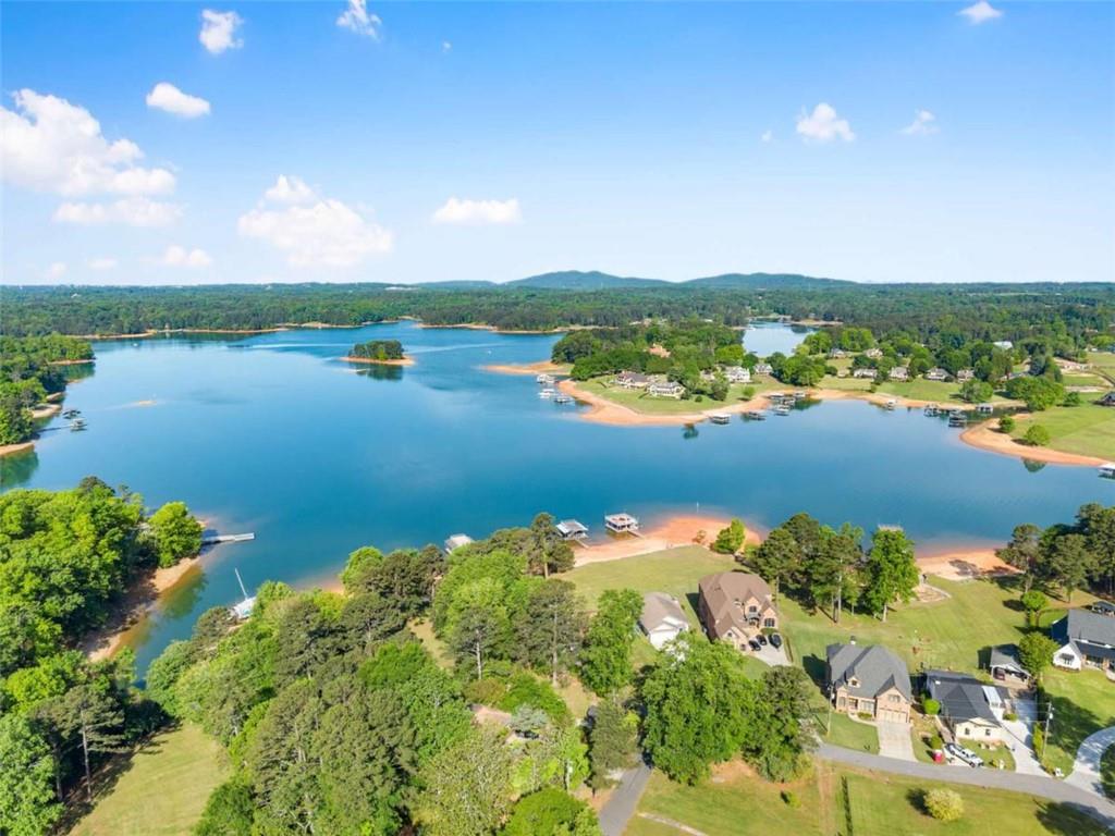 7210 Fields Drive Cumming, GA 30041 - Photo 53 of 58 a view of a lake with a city