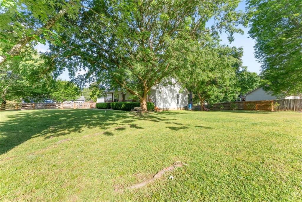 7210 Fields Drive Cumming, GA 30041 - Photo 8 of 58 a view of yard with green space