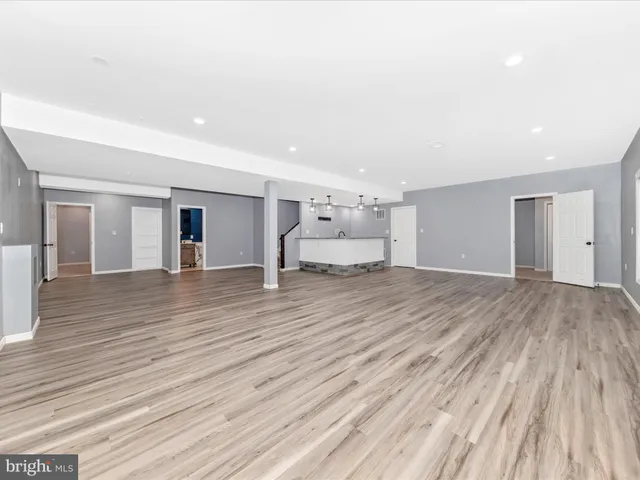 a view of a yard in front of a brick house