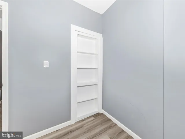 a view of a swimming pool and lounge chair
