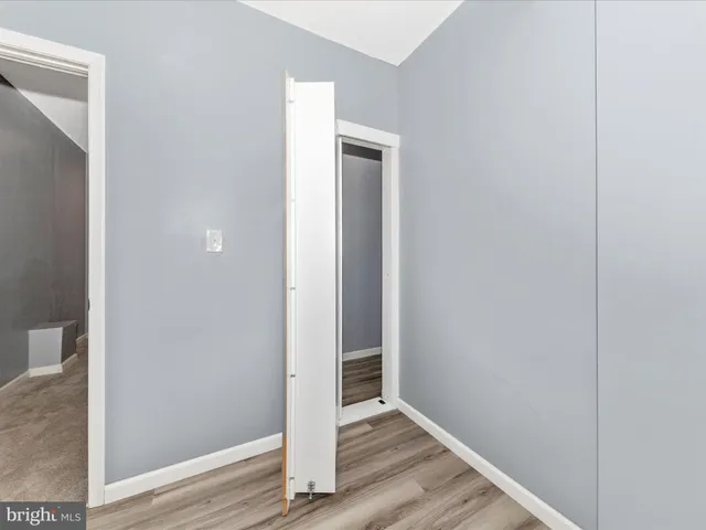 a view of a patio with table and chairs potted plants with sky view