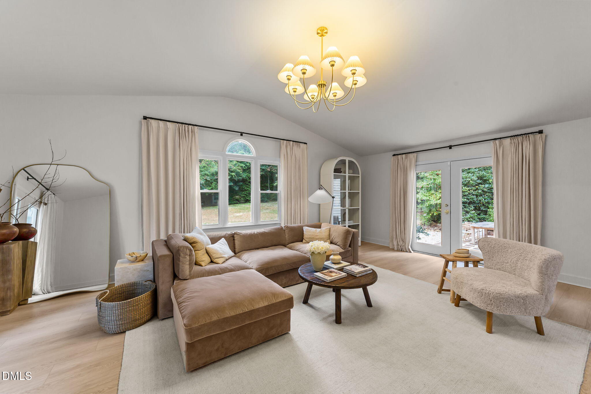 623 Canady Court Willow Spring, NC 27592 - Photo 16 of 42 a living room with furniture and a large window