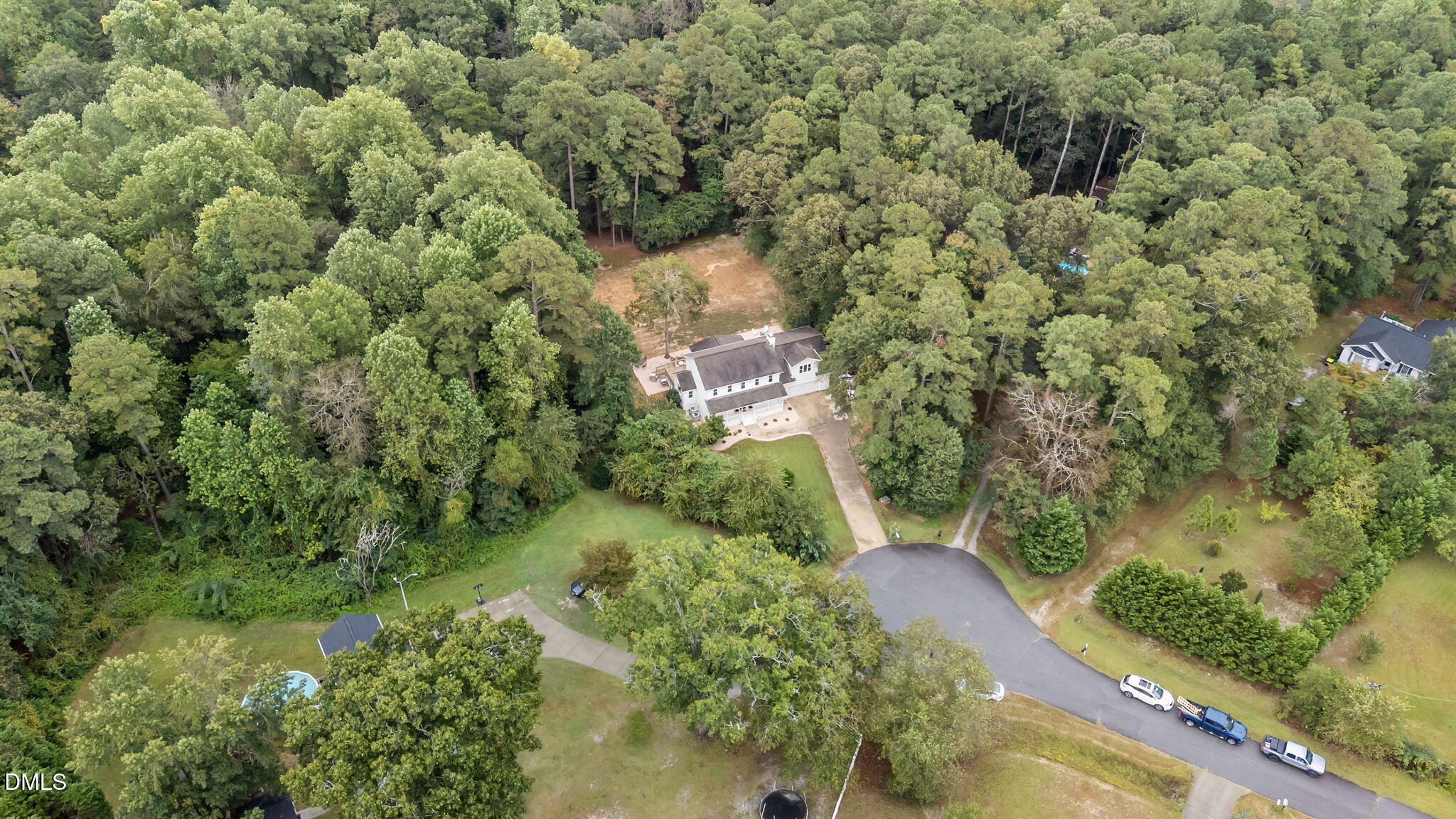 623 Canady Court Willow Spring, NC 27592 - Photo 2 of 42 an aerial view of residential house with outdoor space and trees all around