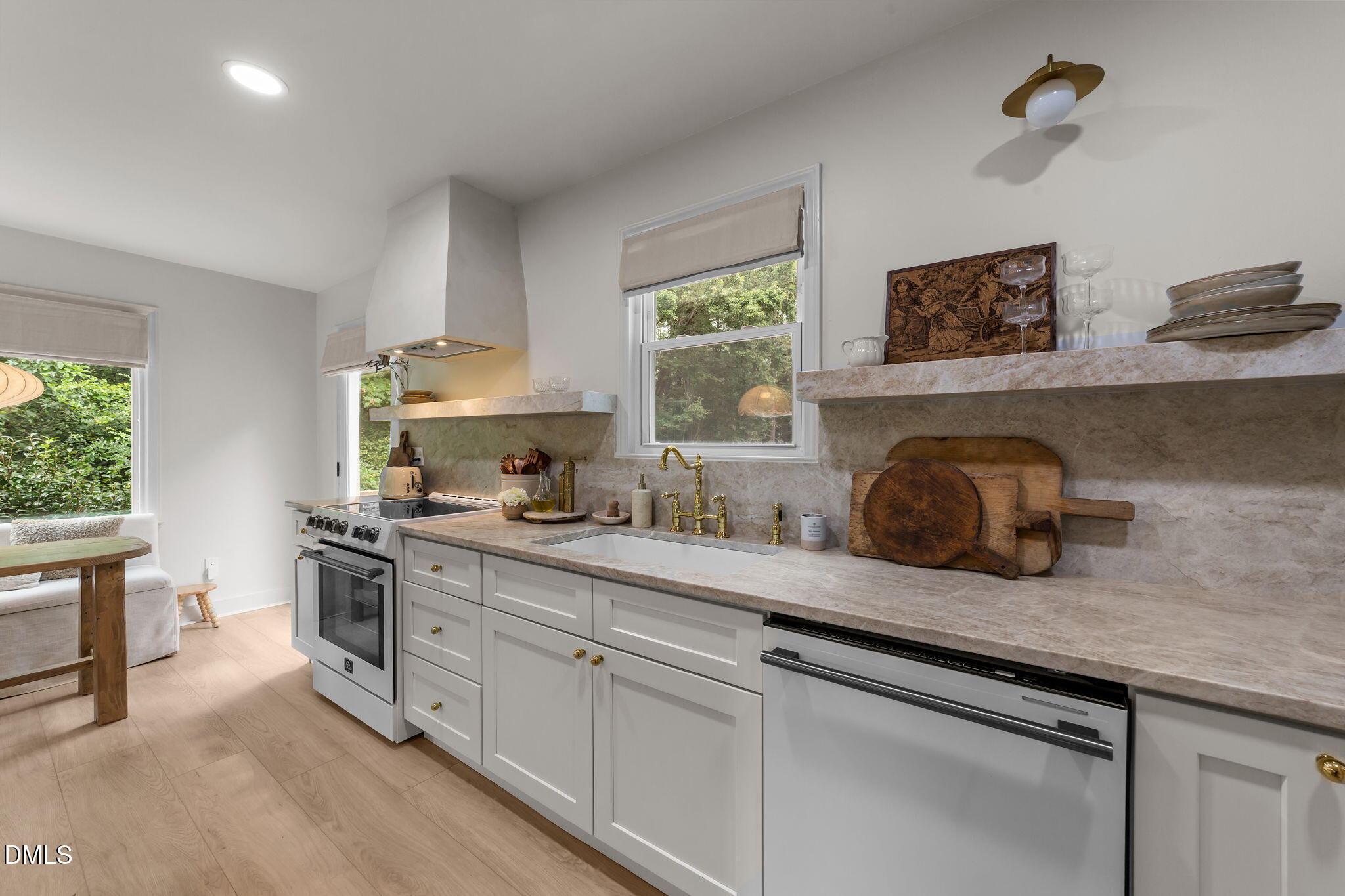 623 Canady Court Willow Spring, NC 27592 - Photo 25 of 42 a kitchen with a sink cabinets and window