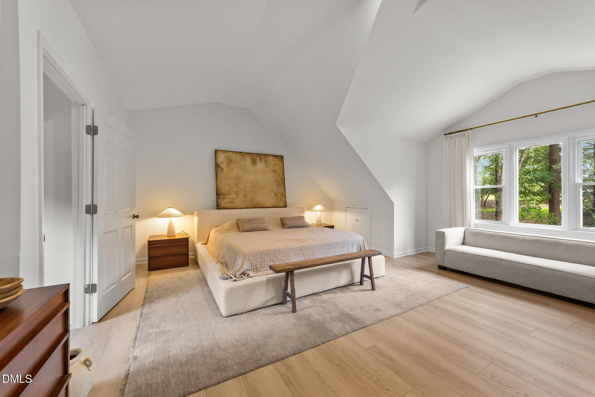 623 Canady Court Willow Spring, NC 27592 - Photo 31 of 42 a spacious bedroom with a bed and a window