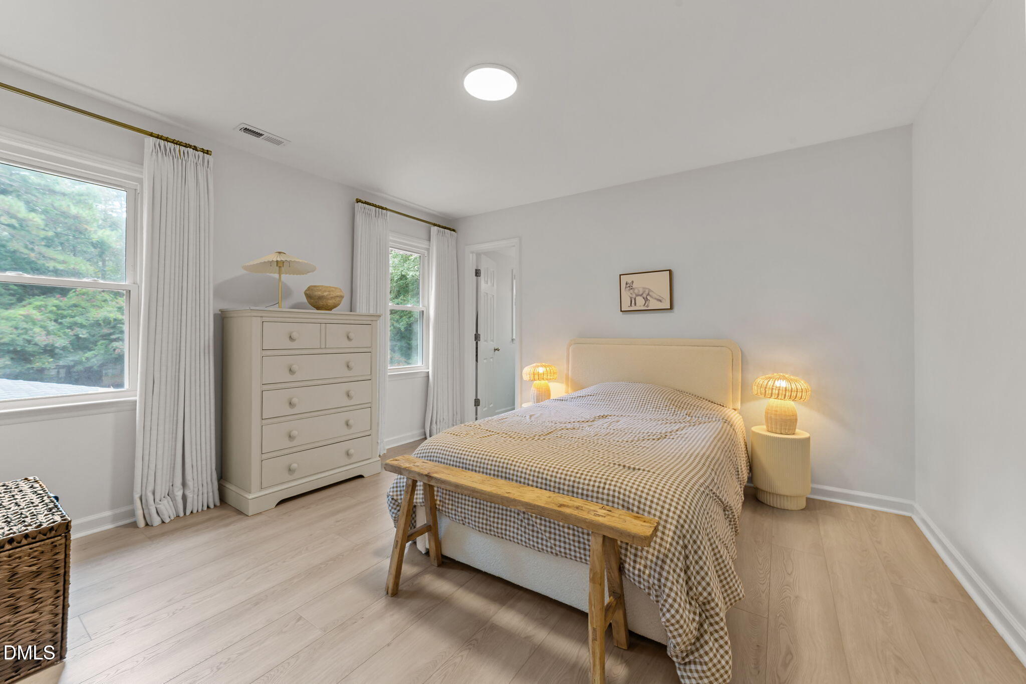 623 Canady Court Willow Spring, NC 27592 - Photo 35 of 42 a bedroom with a bed and a window