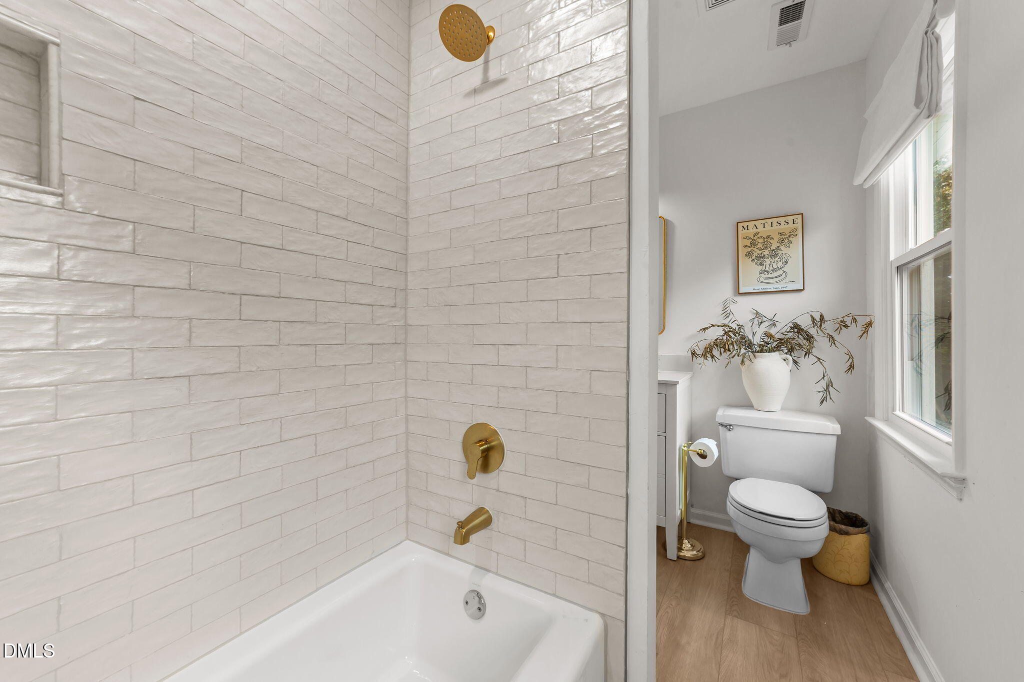 623 Canady Court Willow Spring, NC 27592 - Photo 38 of 42 a bathroom with a toilet and a shower