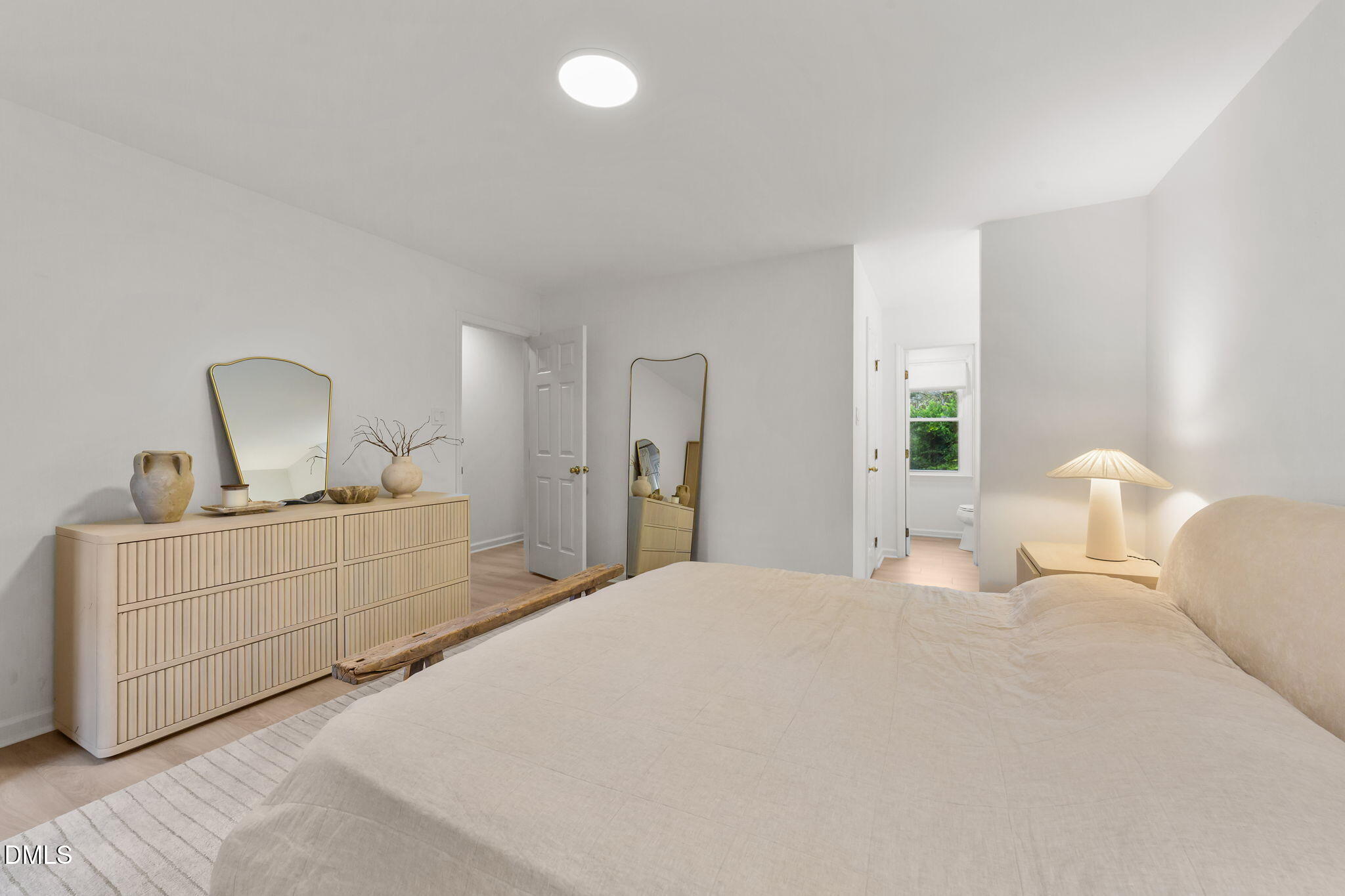 623 Canady Court Willow Spring, NC 27592 - Photo 41 of 42 a bedroom with a bed and a dresser