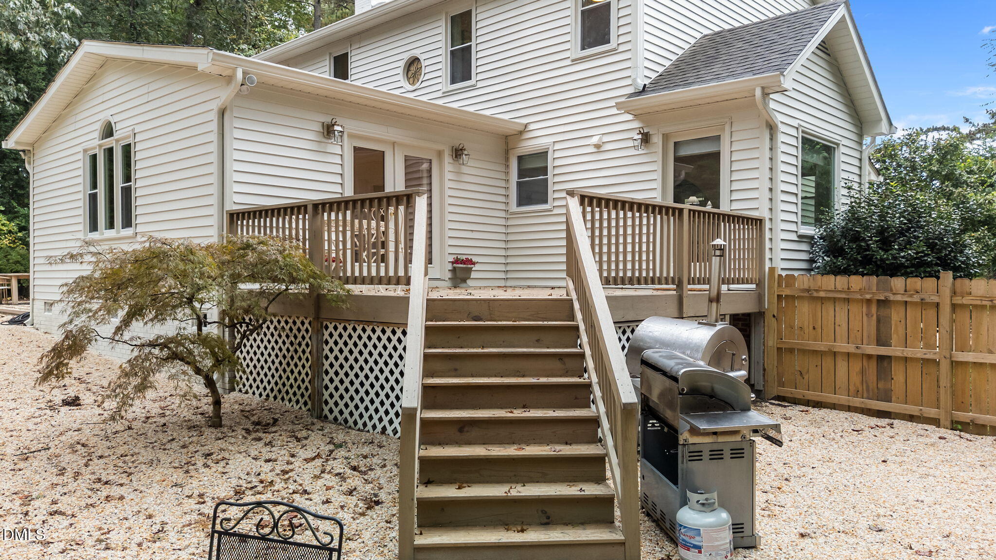 623 Canady Court Willow Spring, NC 27592 - Photo 7 of 42 a front view of a house with a garden