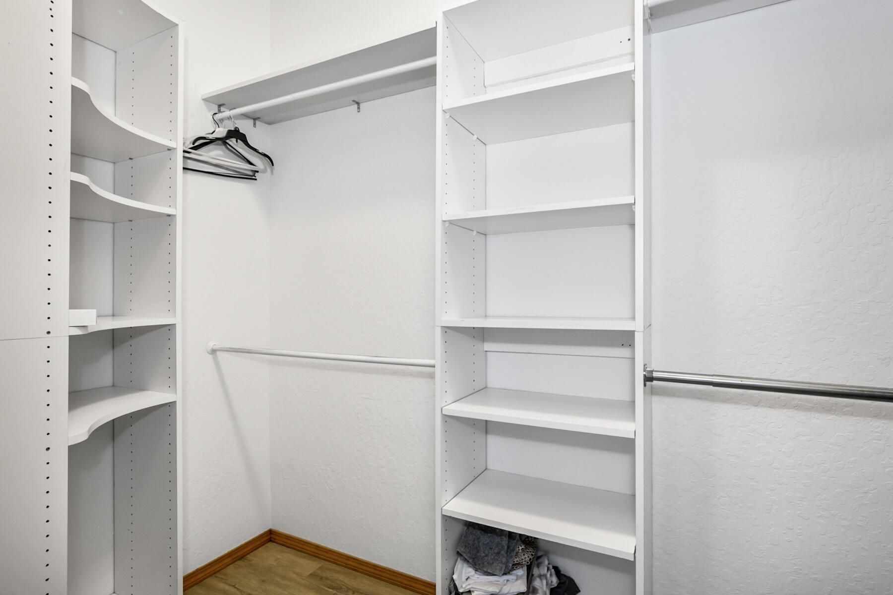 65515 Cline Falls Road Bend, OR 97703 - Photo 31 of 57 a view of walk in closet with empty racks