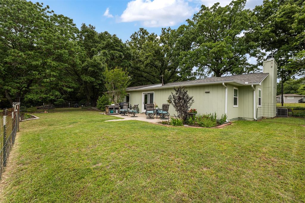 713 Midway Road Tool, TX 75143 - Photo 22 of 28 a house view with swimming pool in front of it
