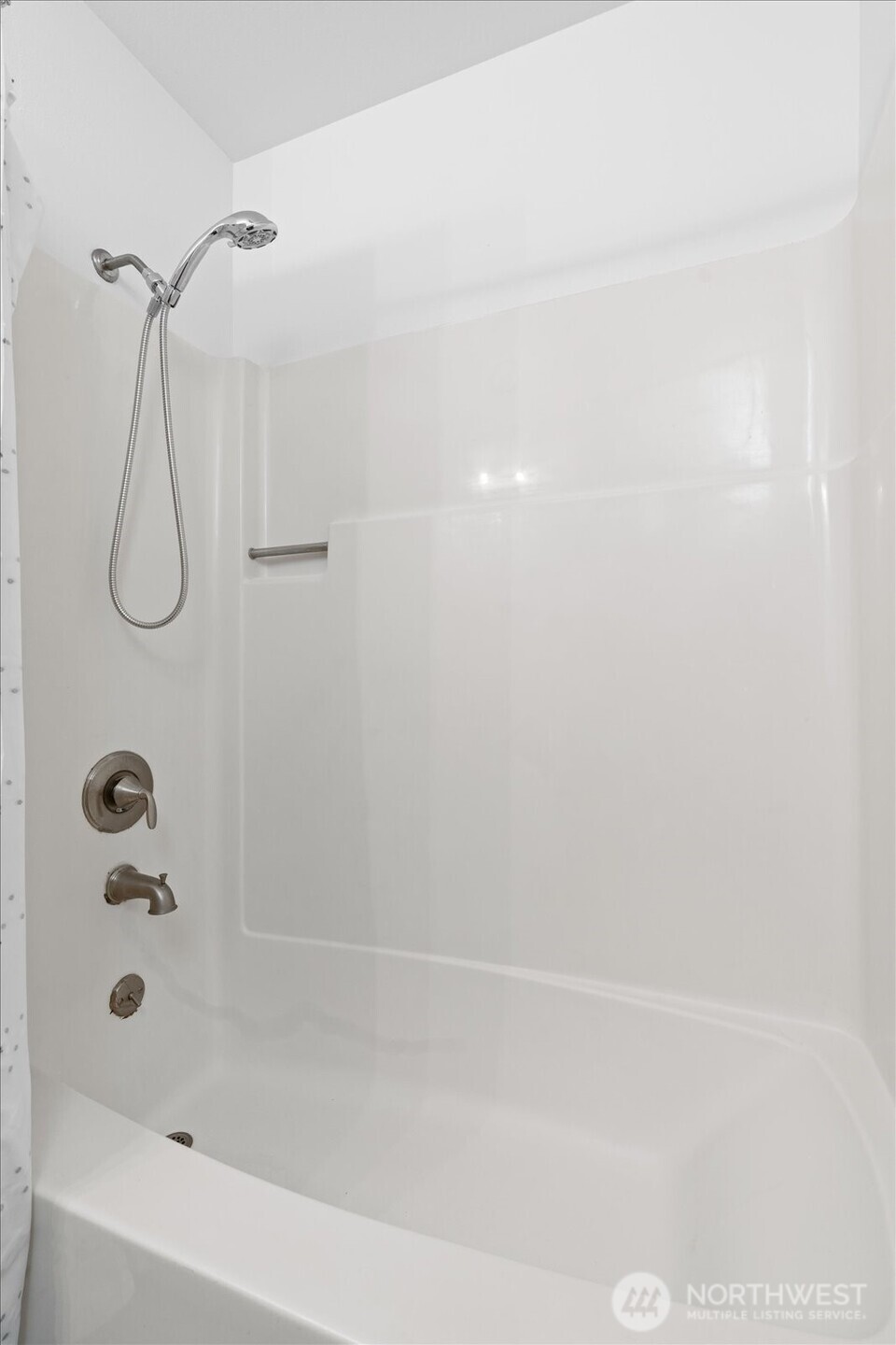 1600 Way E Yeslelr Way East, Unit 102 Seattle, WA 98122 - Photo 23 of 30 a close up of a bathtub in a bathroom