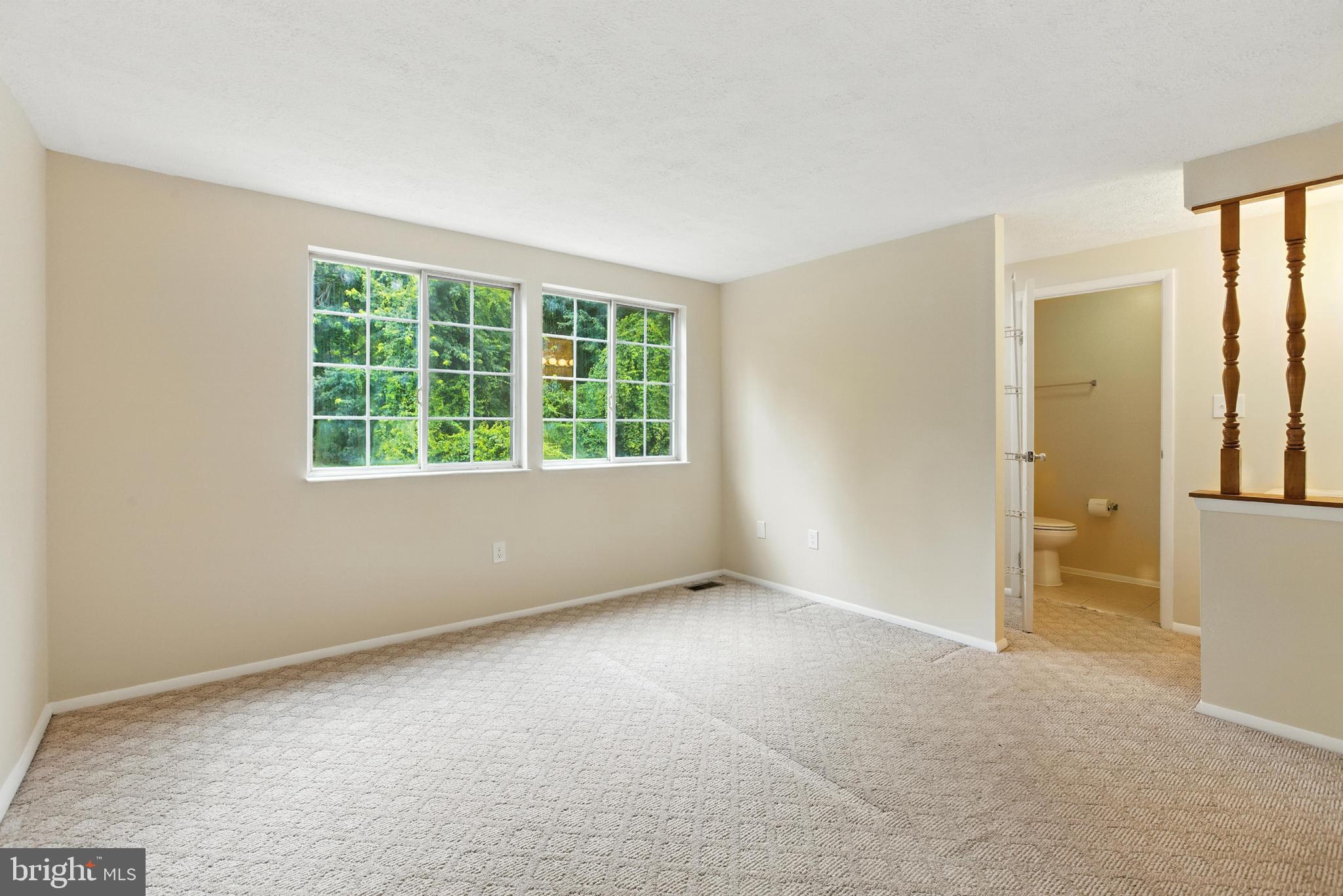1205 Twig Terrace Silver Spring, MD 20905 - Photo 12 of 25 an empty room with windows
