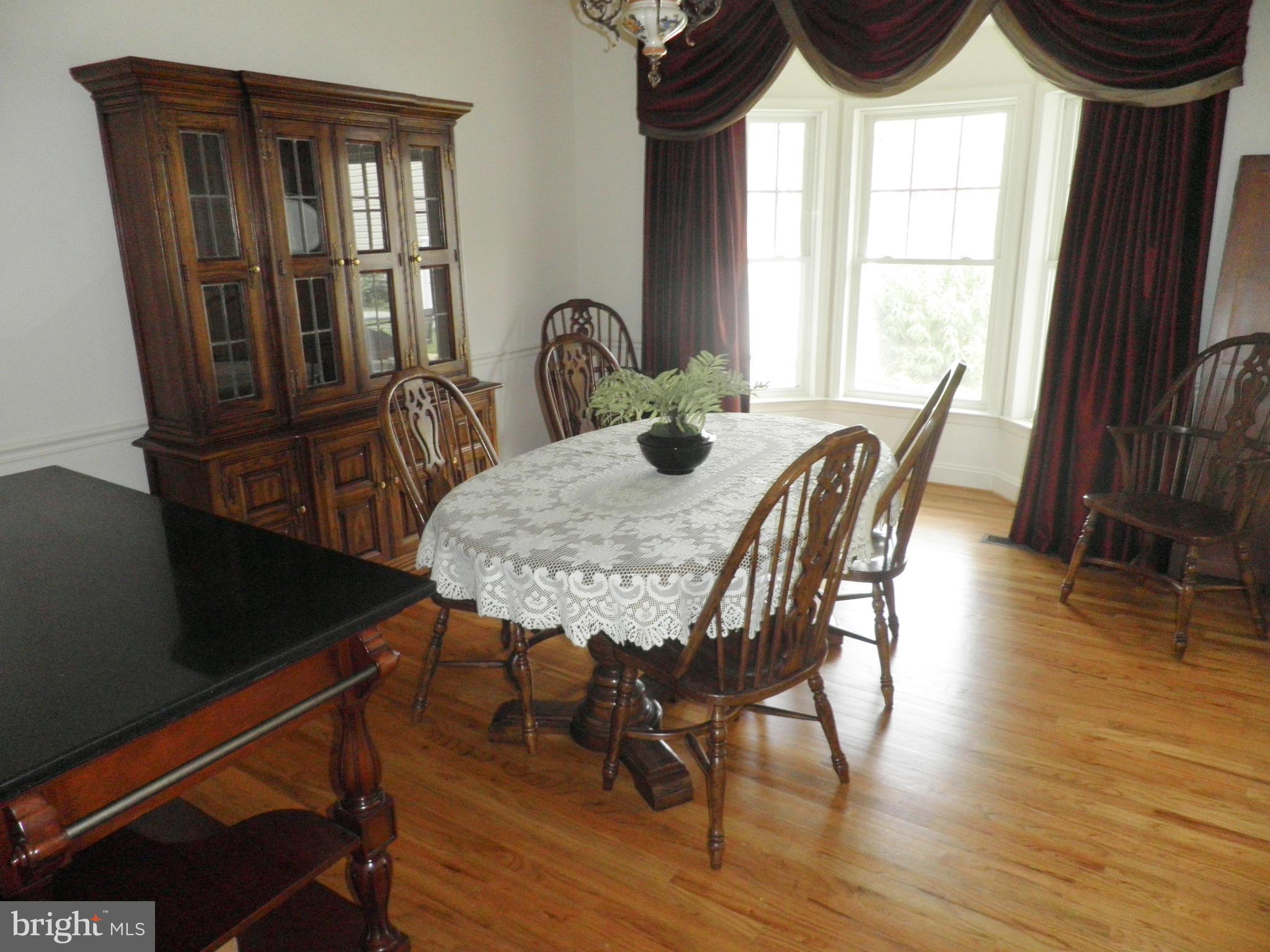 2662 Brook Valley Road Frederick, MD 21701 - Photo 15 of 26 Spacious dining room with hardwood floor