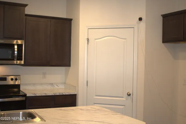 a bathroom with a bathtub and a sink