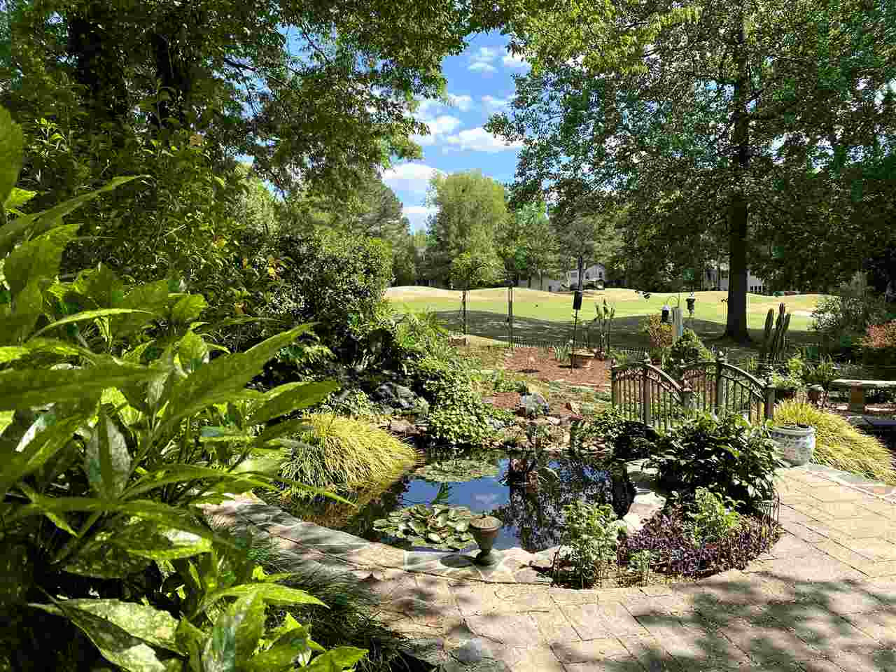 5109 Salem Ridge Road Holly Springs, NC 27540 - Photo 15 of 30 Relax by the Koi pond! Listen to the water bubble down the small waterfall. A little bit of paradise right in your PRIVATE backyard! Koi pond