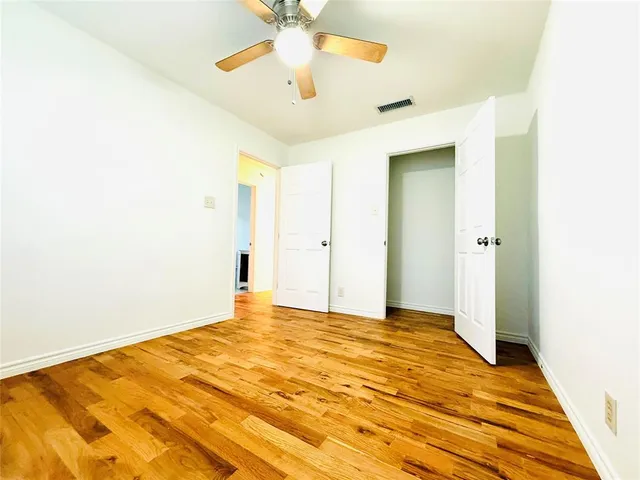 a bathroom with a toilet sink and shower