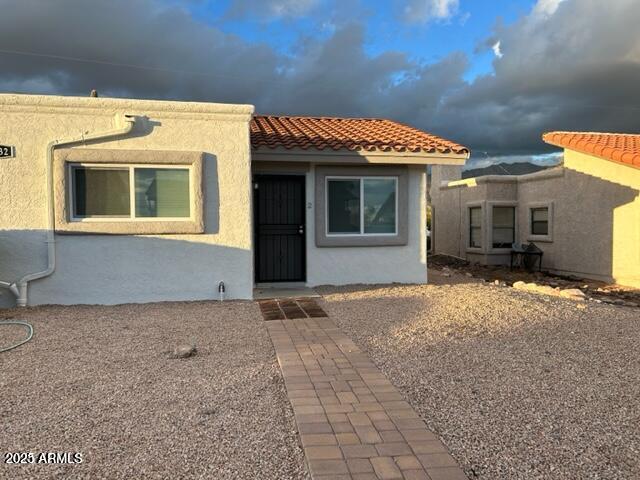 9832 East La Palma Avenue, Unit 2 Gold Canyon, AZ 85118 - Photo 1 of 24 a view of a house with a outdoor space