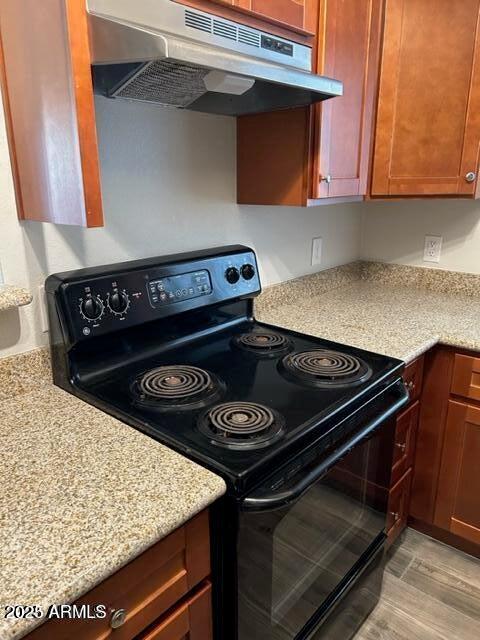 9832 East La Palma Avenue, Unit 2 Gold Canyon, AZ 85118 - Photo 12 of 24 a close view of stove