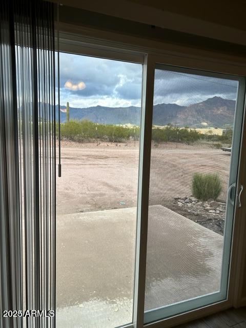9832 East La Palma Avenue, Unit 2 Gold Canyon, AZ 85118 - Photo 7 of 24 a view of a glass door from a window