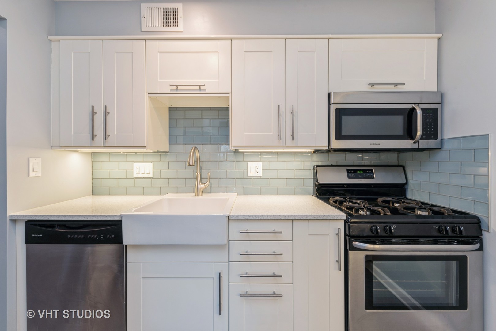 5100 Carriageway Drive, Unit 109 Rolling Meadows, IL 60008 - Photo 7 of 12 a kitchen with cabinets stainless steel appliances and a sink