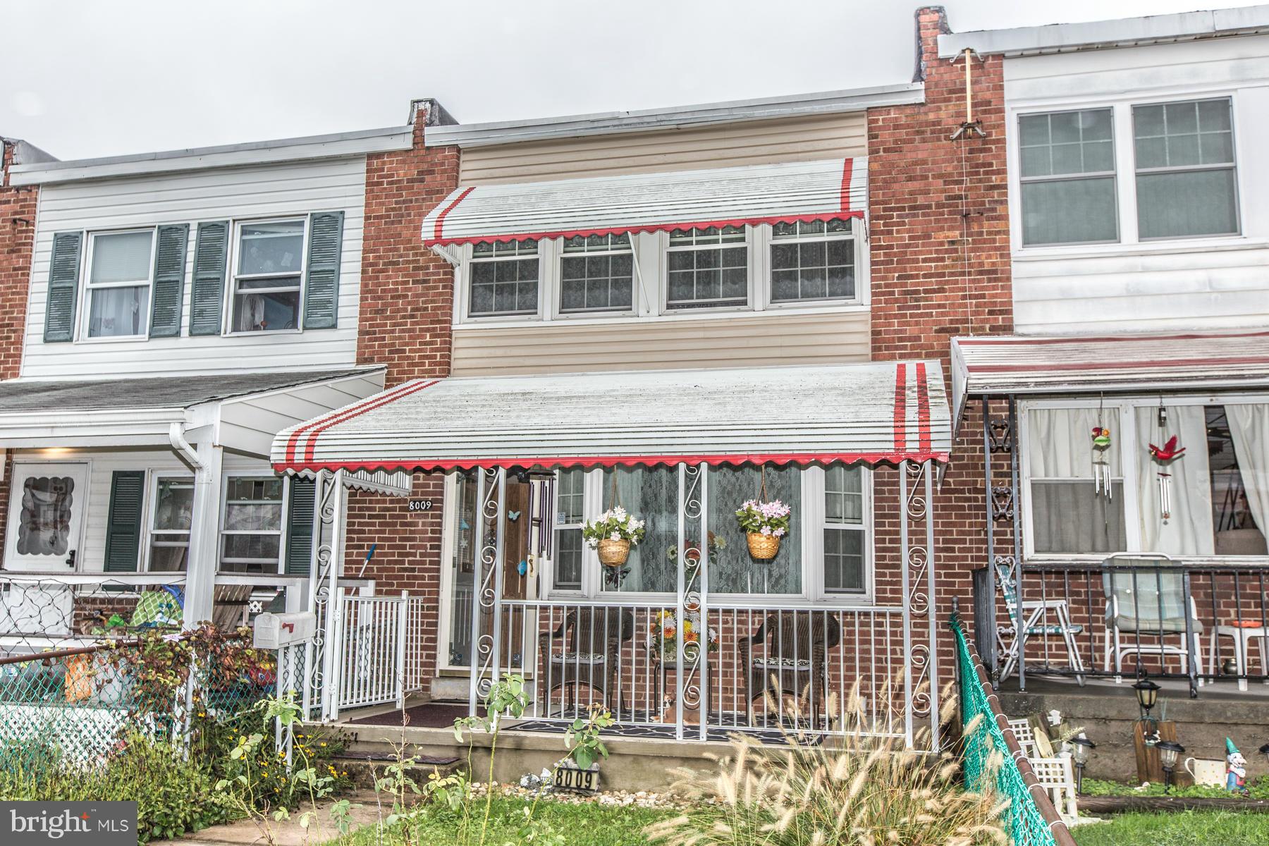8009 Wynbrook Road Baltimore, MD 21224 - Photo 26 of 27 a front view of a house with a large window