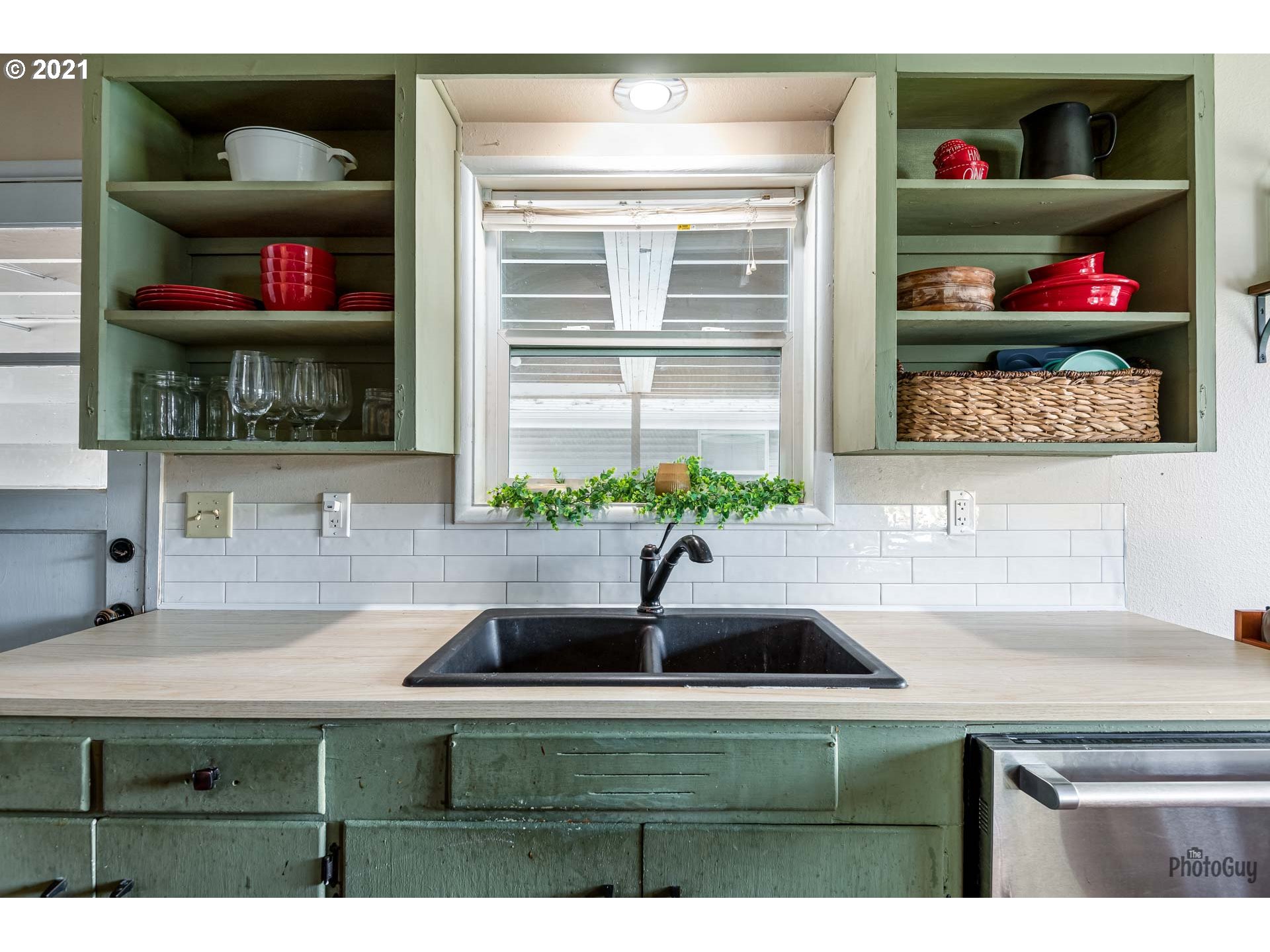 1872 I Street Springfield, OR 97477 - Photo 12 of 24 a kitchen with a sink and a microwave