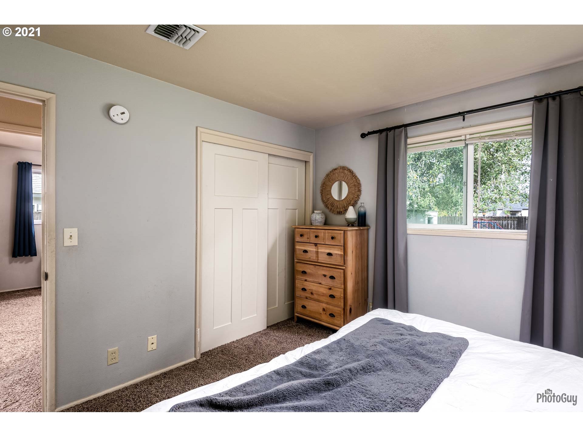 1872 I Street Springfield, OR 97477 - Photo 16 of 24 a bedroom with a bed and a window