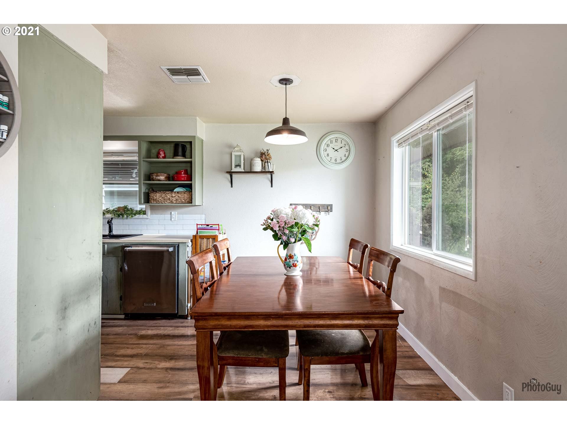 1872 I Street Springfield, OR 97477 - Photo 9 of 24 a dining room with furniture and window