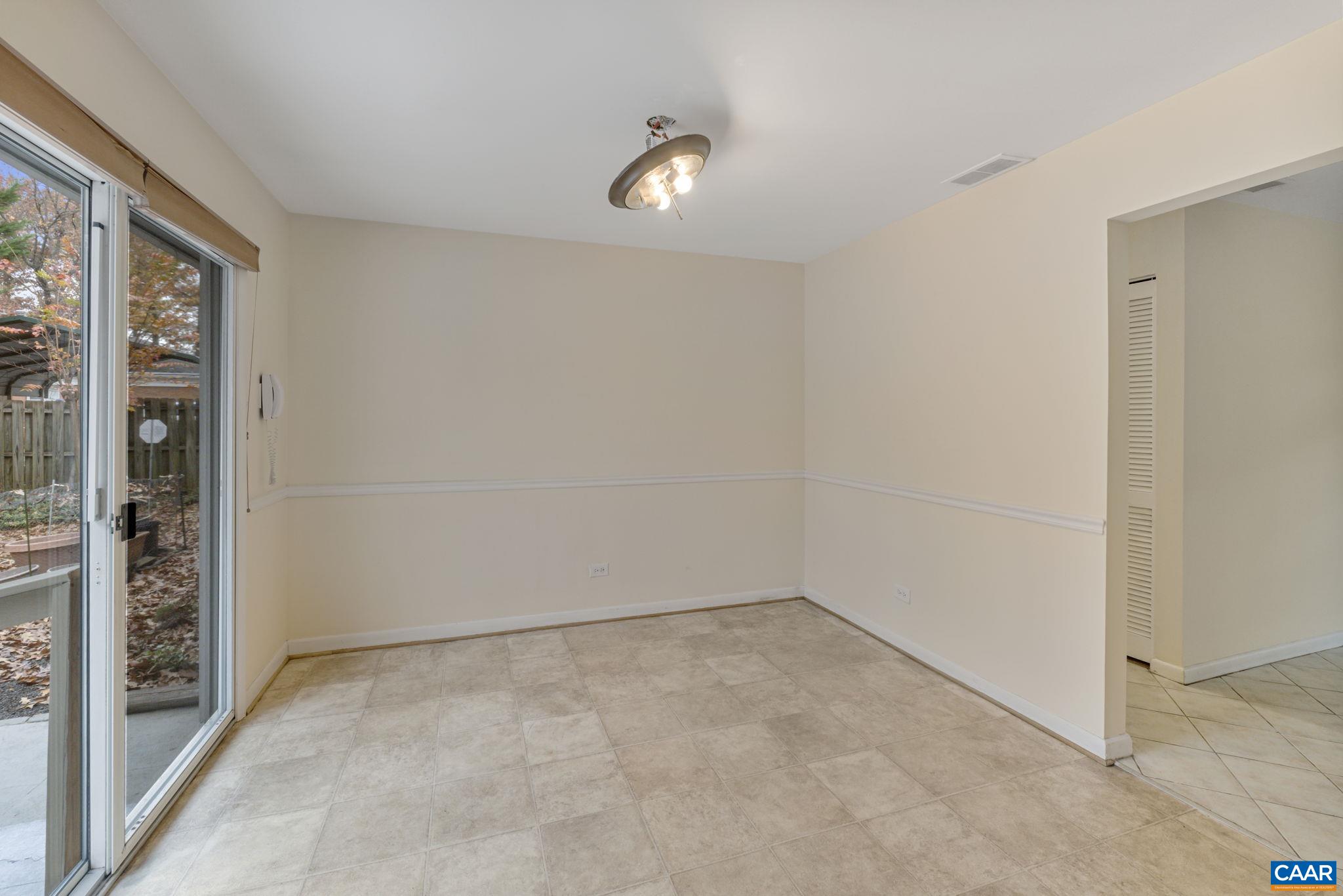 704 Shamrock Road Charlottesville, VA 22903 - Photo 20 of 41 an empty room with window