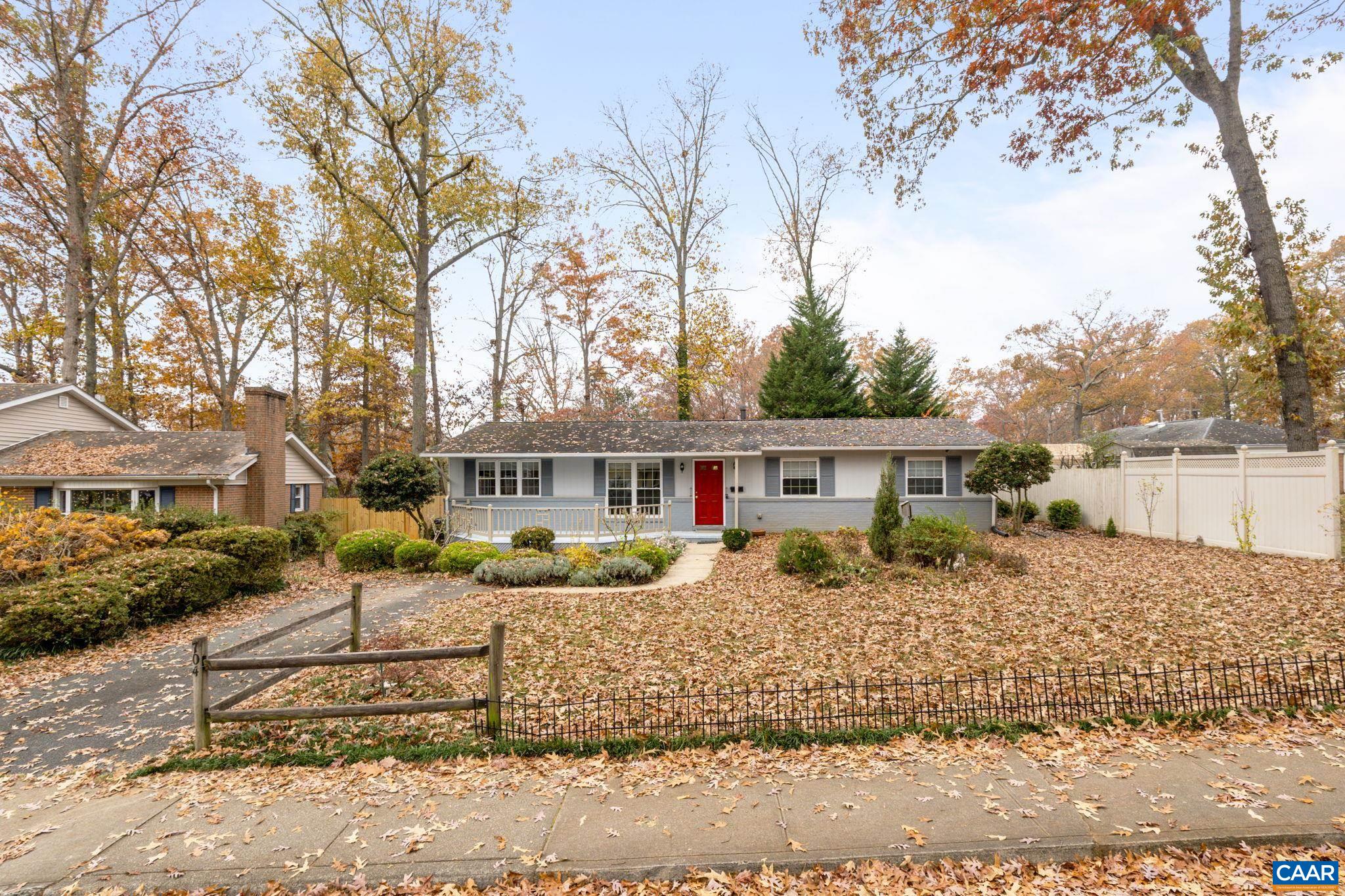 704 Shamrock Road Charlottesville, VA 22903 - Photo 7 of 41 a front view of a house with a yard