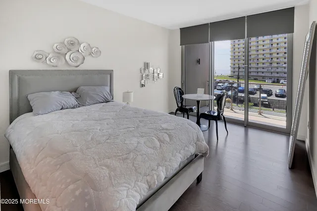 a spacious bathroom with a sink a toilet and shower