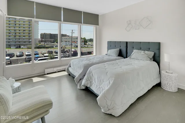 a bedroom with a large bed and a table