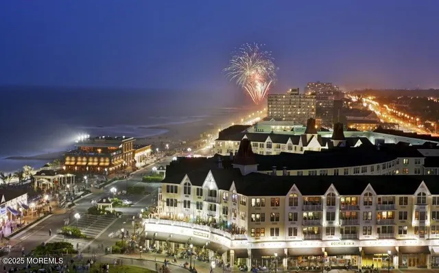 a view of a hallway with washer and dryer