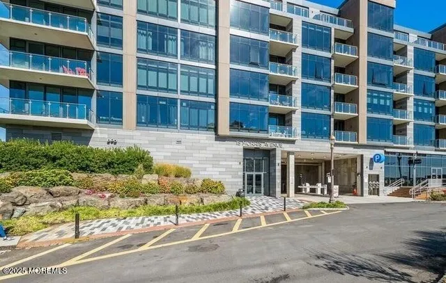 a view of a building with a street