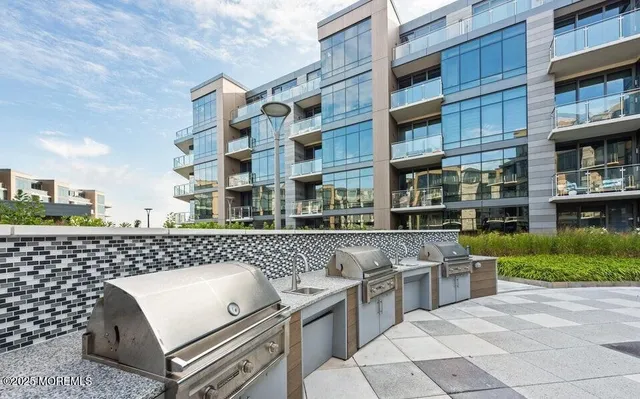 a view of a balcony with chairs