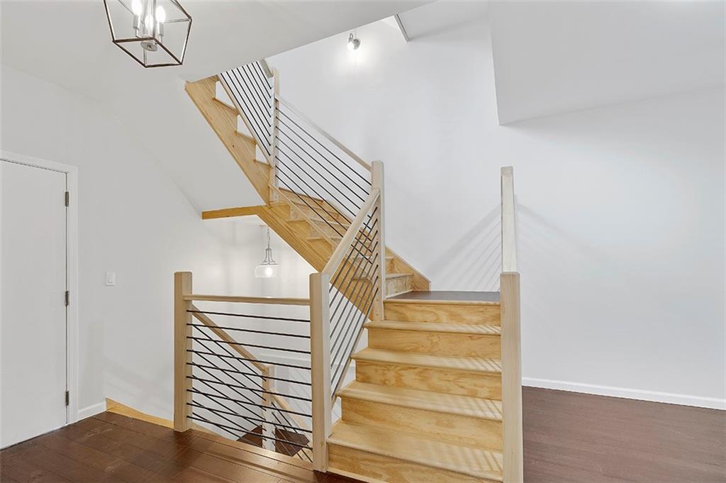 26 Jacksonia Street Pittsburgh, PA 15212 - Photo 9 of 25 Open stairway leads you up to the main floor