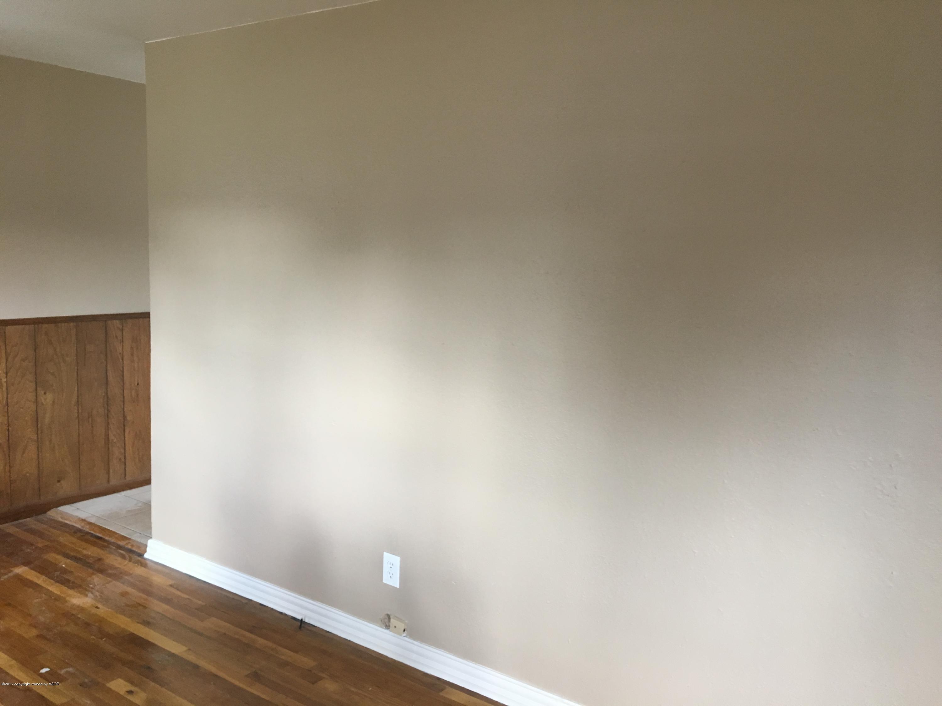4651 Crockett Street Amarillo, TX 79110 - Photo 4 of 18 a view of an empty room