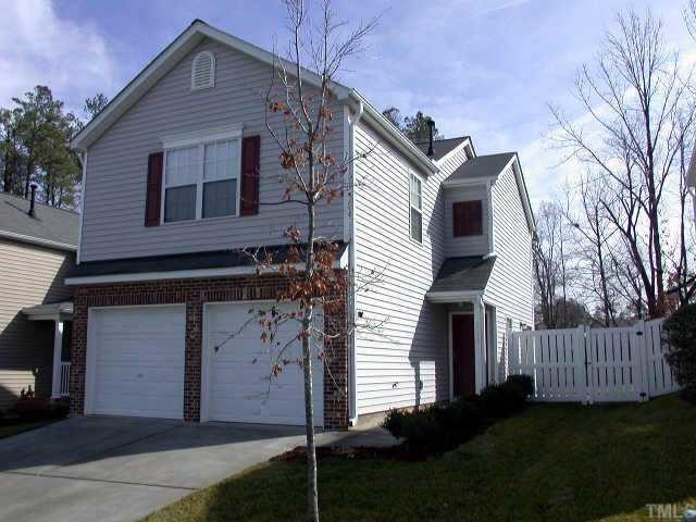 8920 Shallcross Way Raleigh, NC 27617 - Photo 1 of 1 a front view of a house with a yard