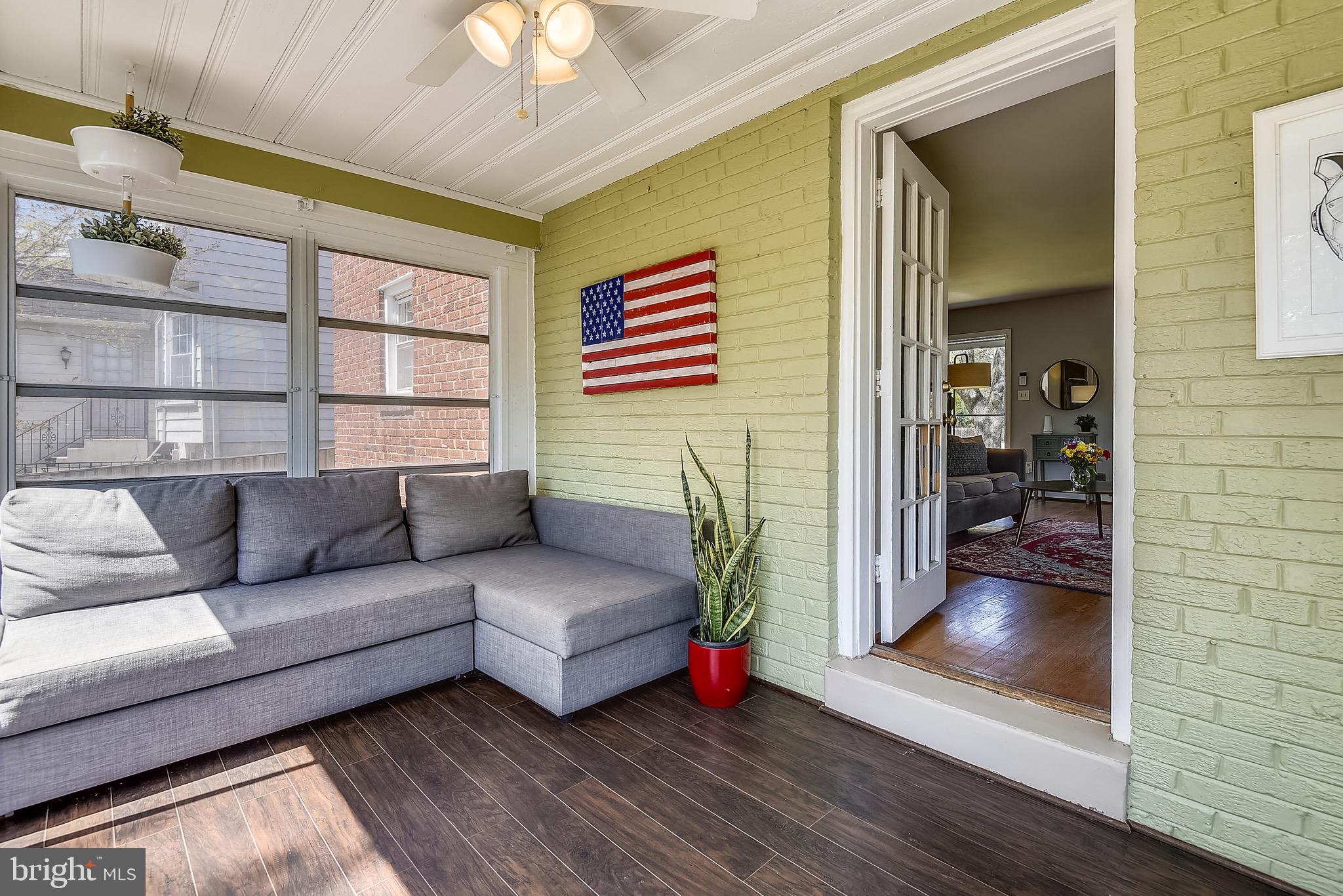 2408 Homestead Drive Silver Spring, MD 20902 - Photo 4 of 24 Three seasons porch with luxury vinyl flooring