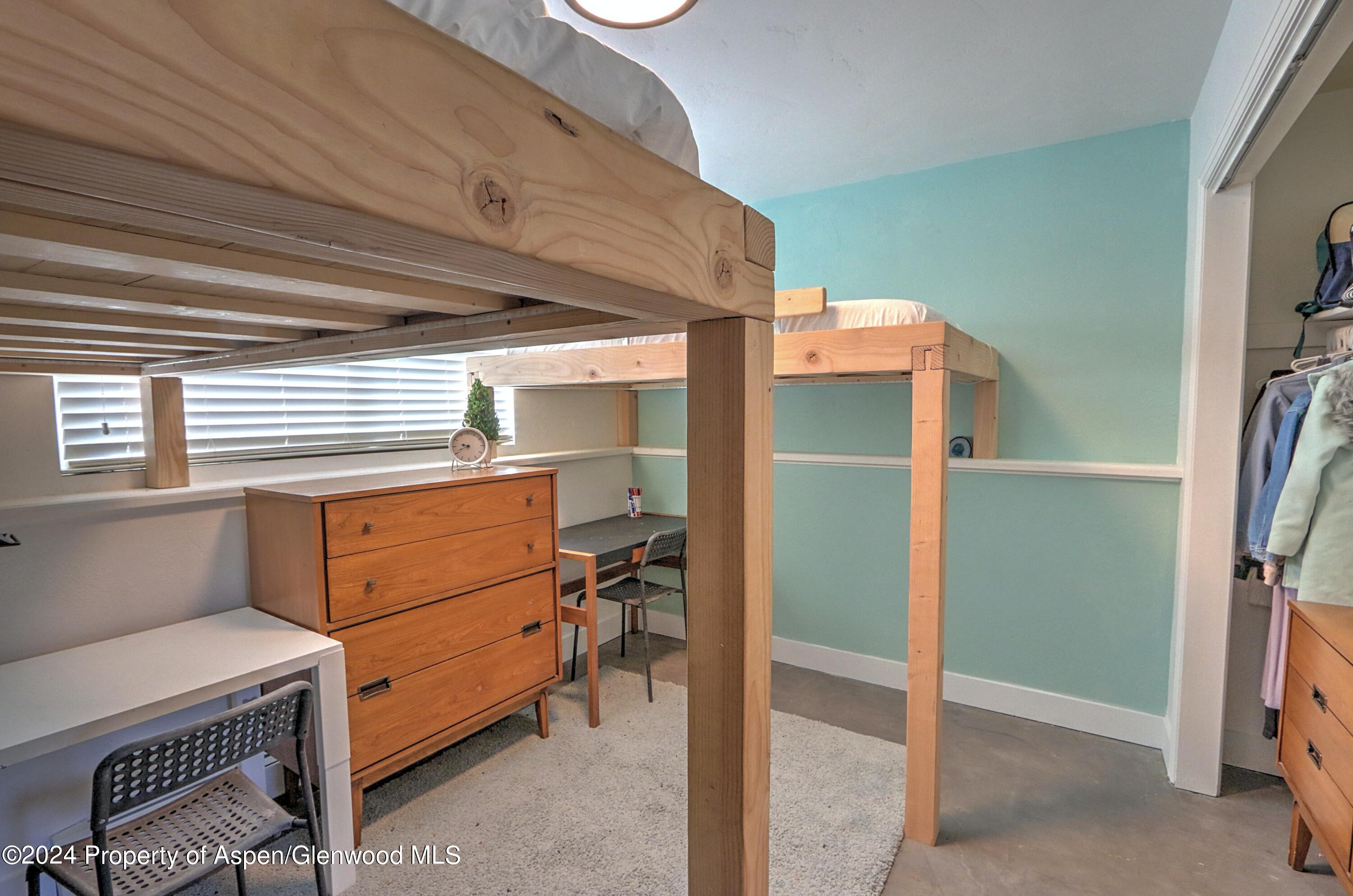 1329 East 8th Street Rifle, CO 81650 - Photo 20 of 26 a room with closet and a window