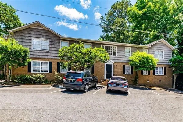 a car parked in front of a house